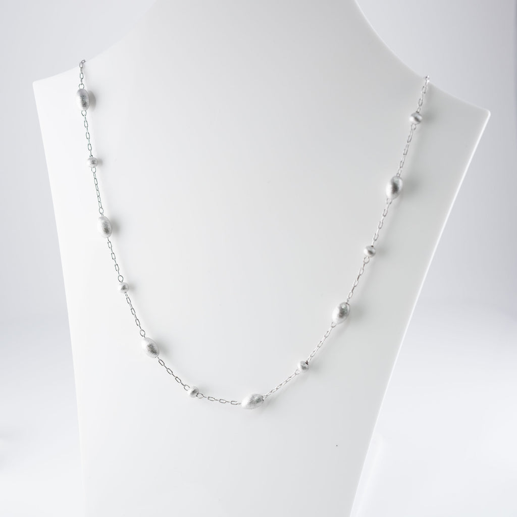 Collana Piccoli Ovali E Cerchi Striati