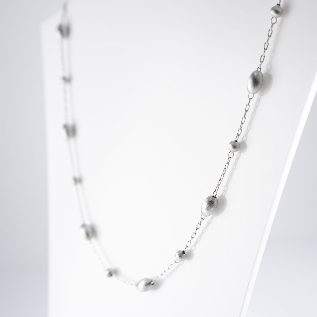 Collana Piccoli Ovali E Cerchi Striati