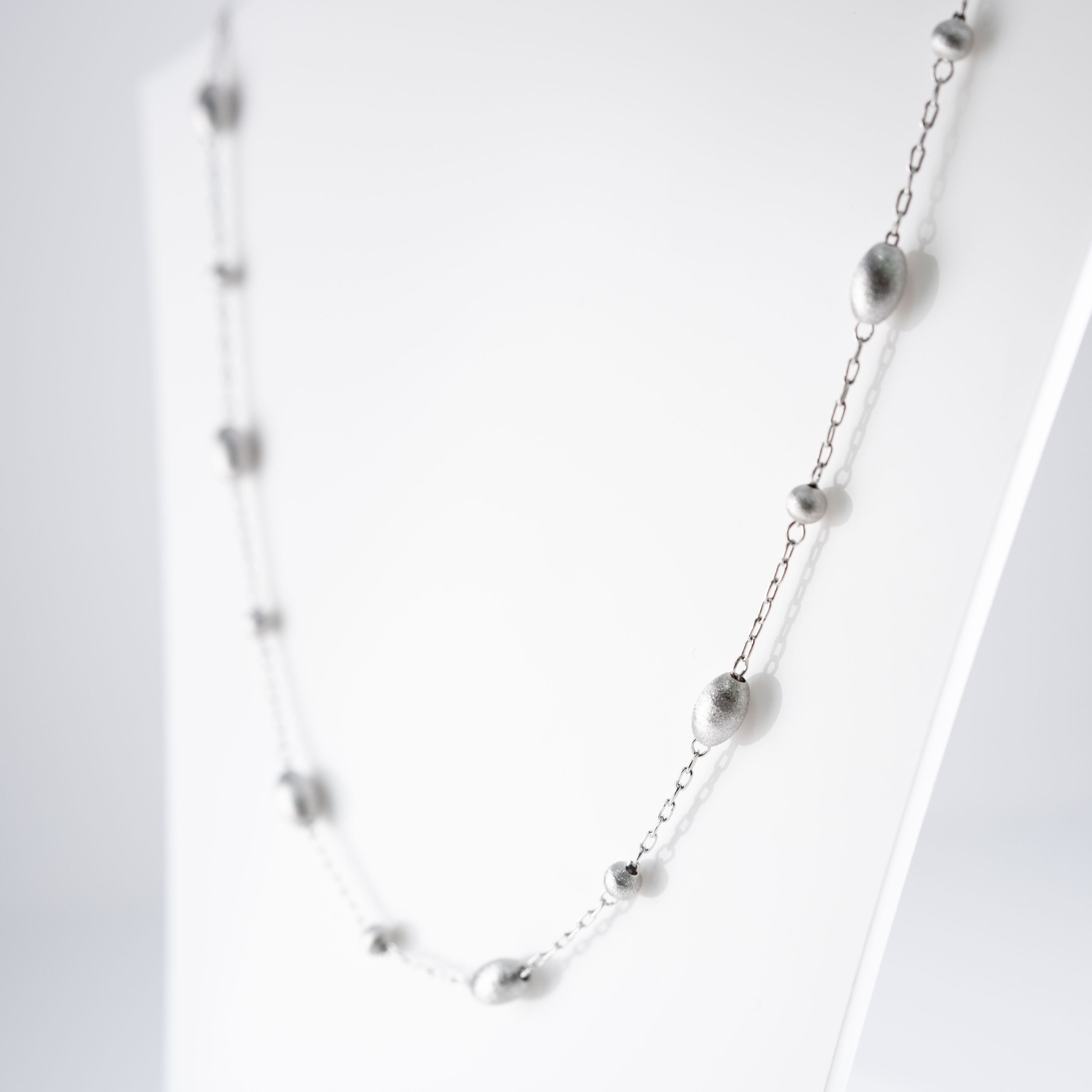 Collana Piccoli Ovali E Cerchi Striati