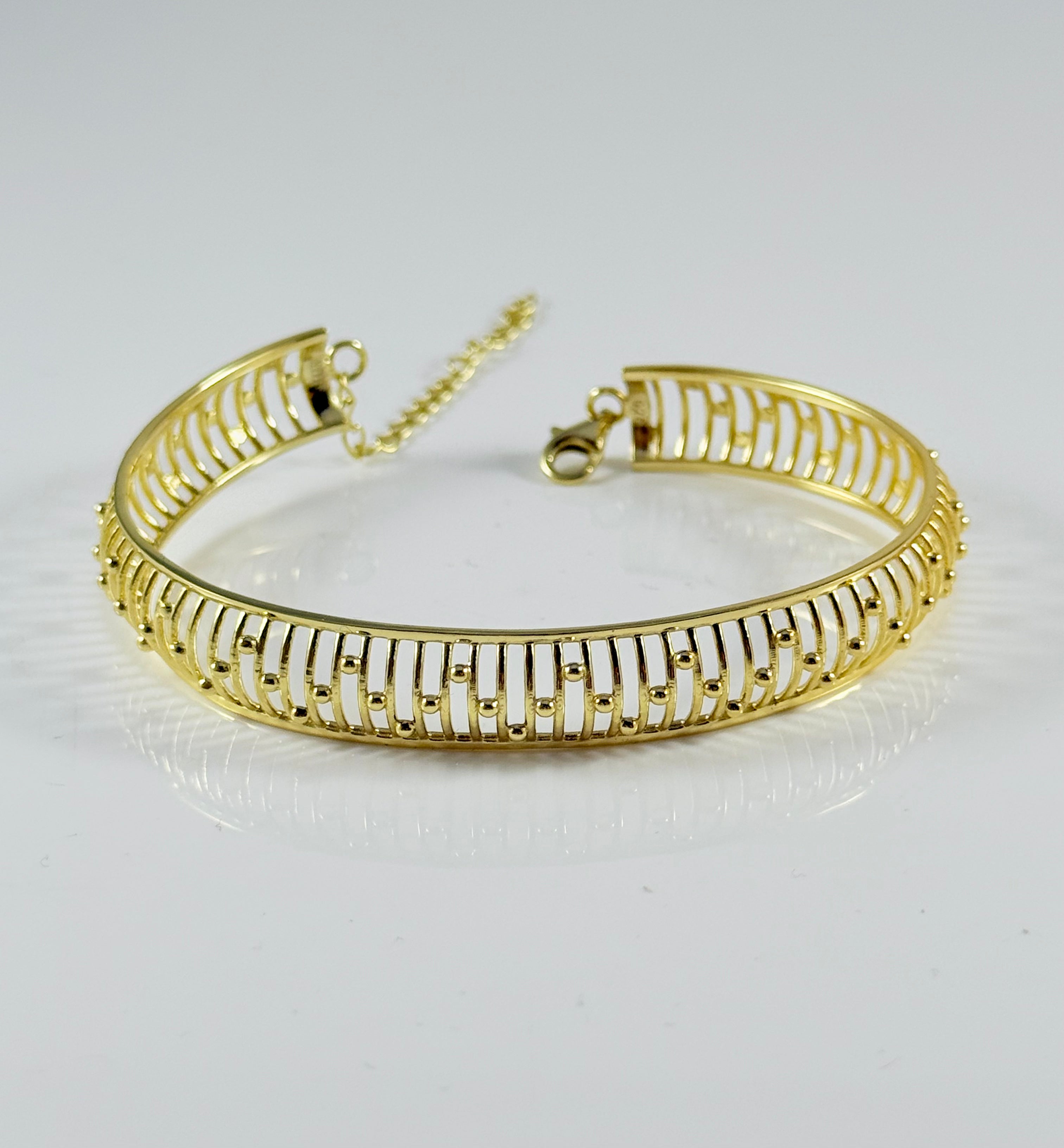 Bracciale rigido traforato