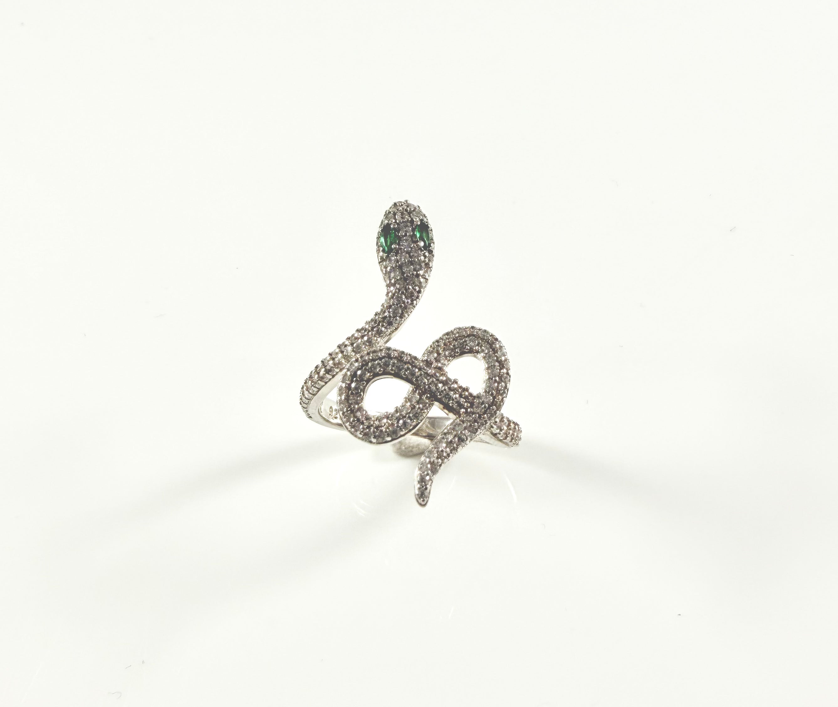 Anello serpente occhi verdi