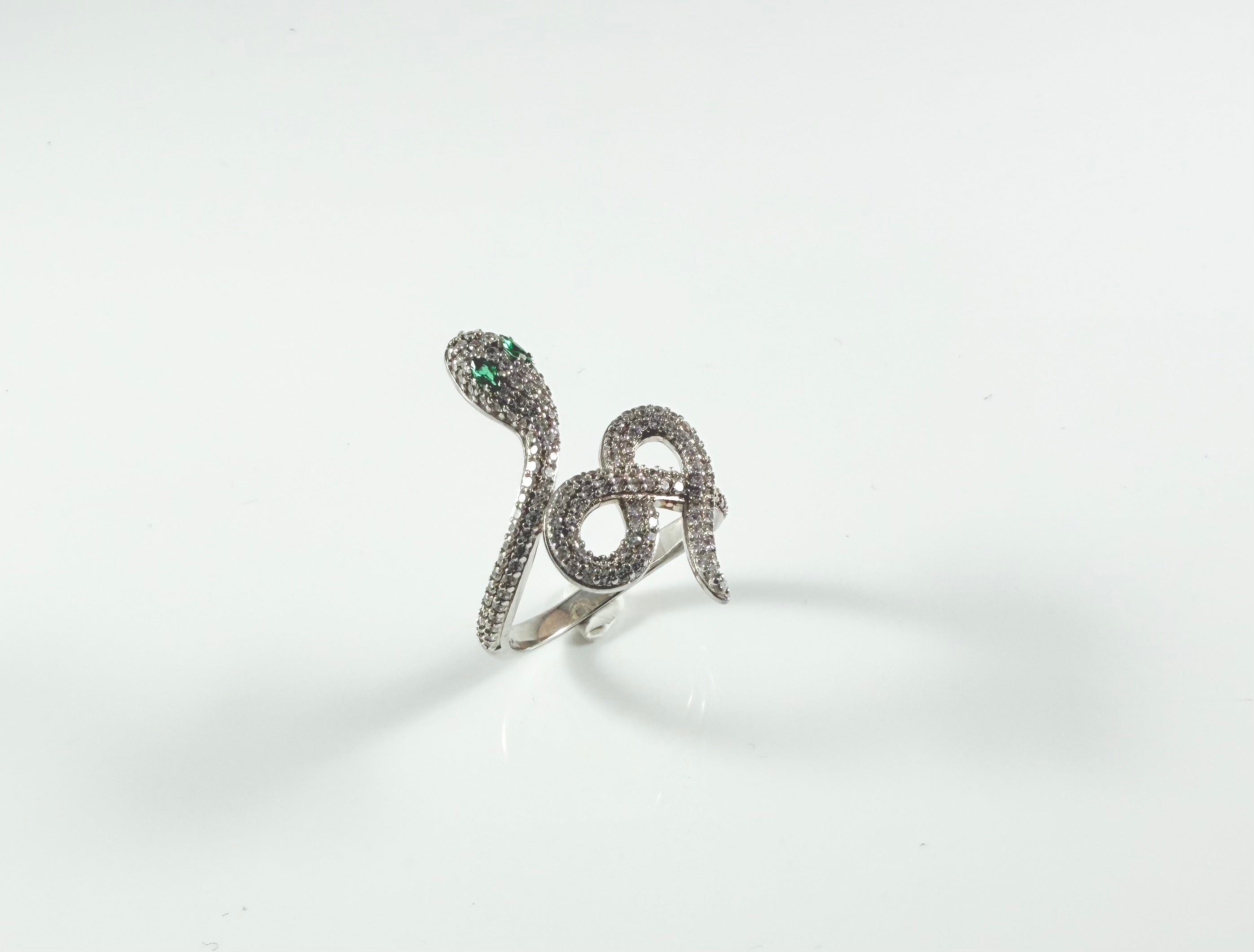 Anello serpente occhi verdi