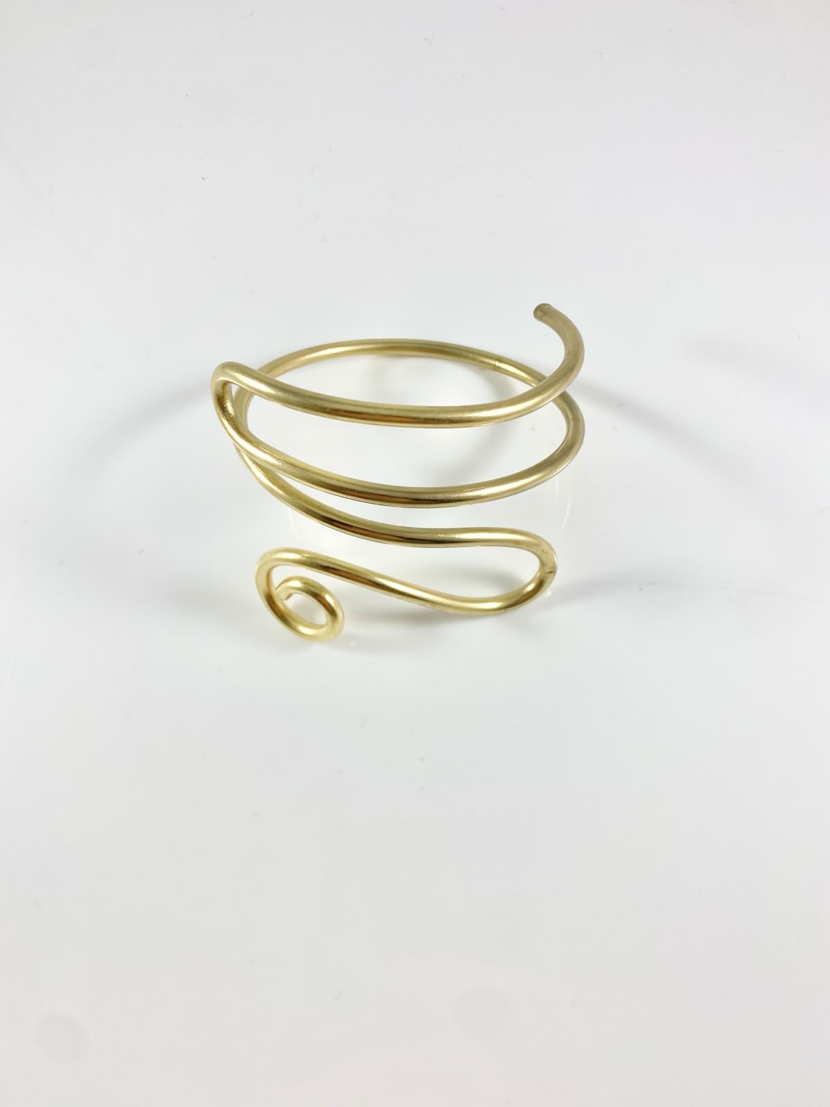 Bracciale rigido intrecciato